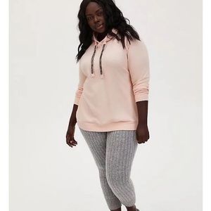 Torrid light pink embellished string hoodie.